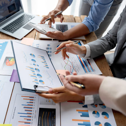 A group of digital marketing agency experts monitoring results and KPIs